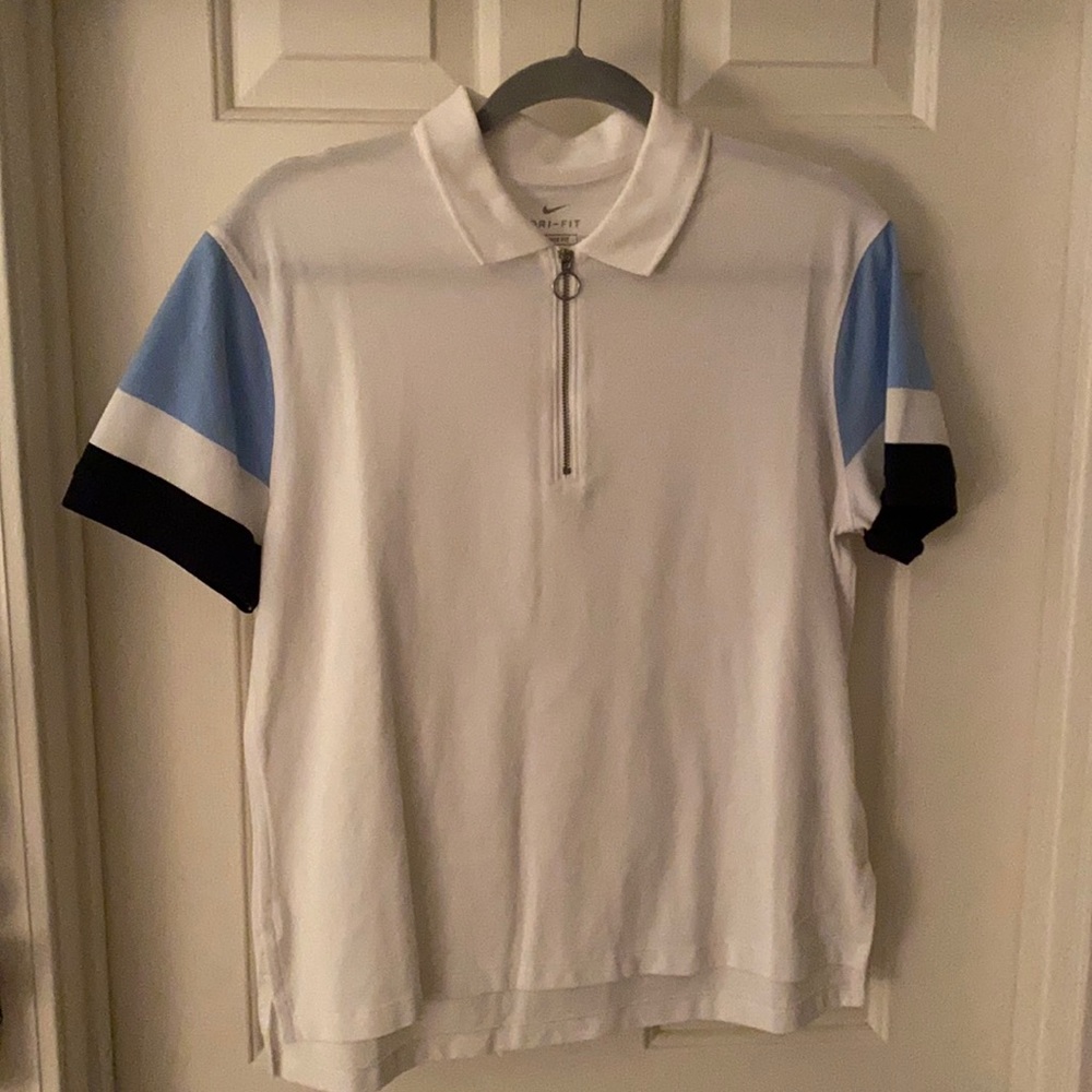 Nike golf shirt.